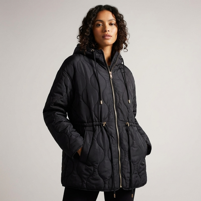 Veste matelassée à capuche pour femmes Aurelia | Taille à cordon, fermeture éclair devant