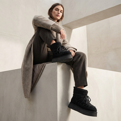 Bottes de neige noires pour femmes Bella | Cuir de vache, chaudes et élégantes