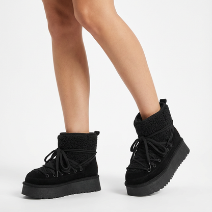 Bottes de neige noires pour femmes Bella | Cuir de vache, chaudes et élégantes