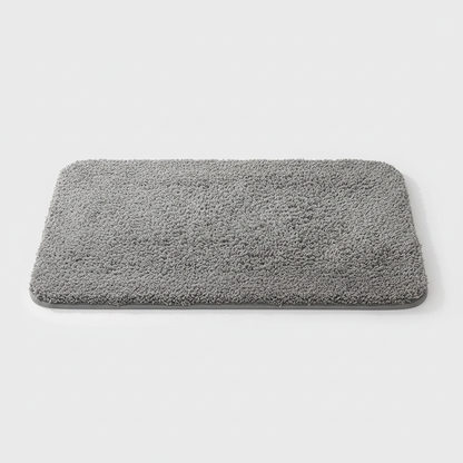 Ultra-Soft Plush Bath Rug in Grey on clean premium background
