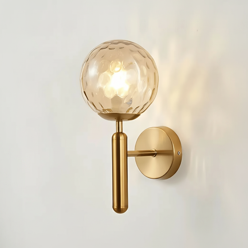 BrassElegance wall sconce - amber dimple glass globe studio packshot