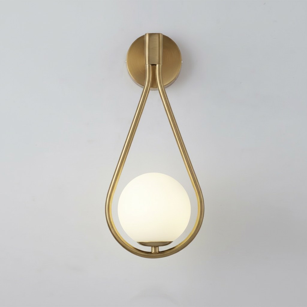 Droplet Wall Light - Brass teardrop studio packshot