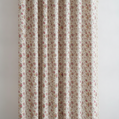 Floral tasseled soft cotton curtain panel hung, full rose print visible