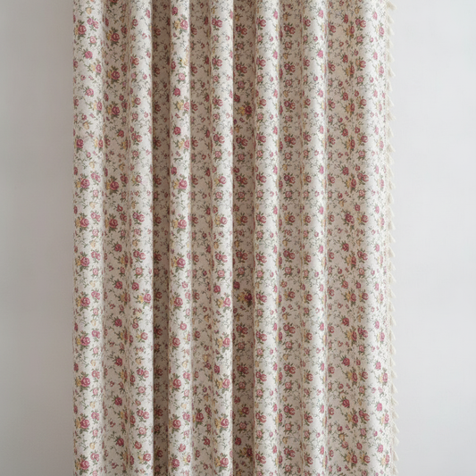 Floral tasseled soft cotton curtain panel hung, full rose print visible