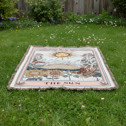 Celestial Tapestry Throw spread on grass in a garden