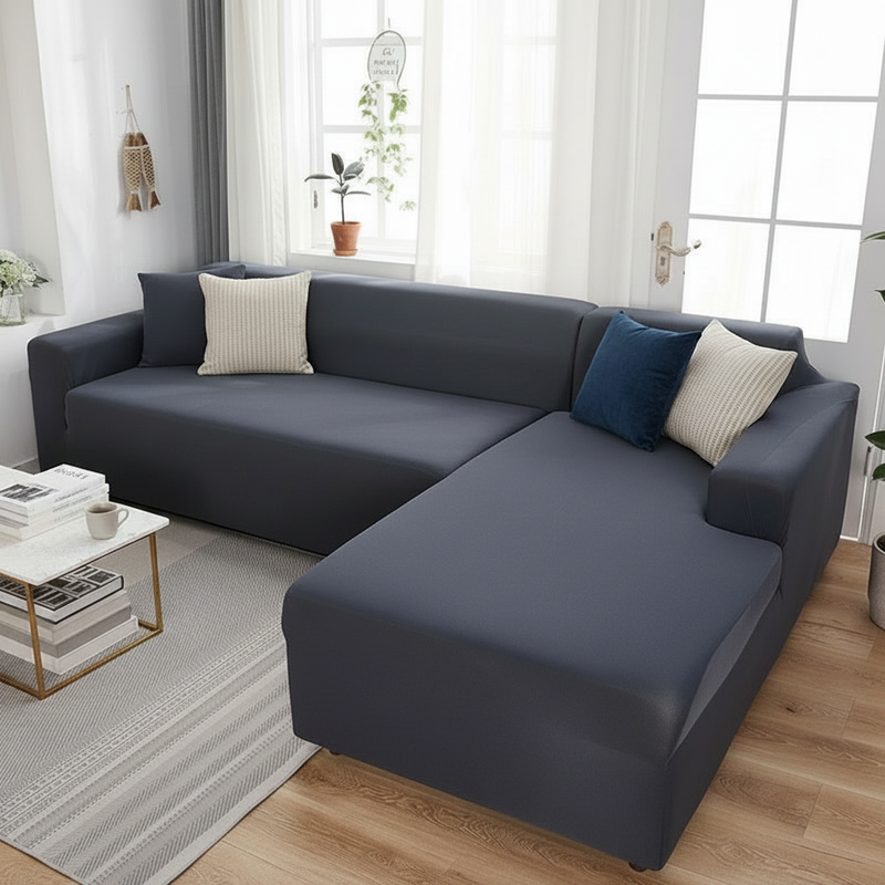 Clay grey L-shaped sofa slipcover styled in a modern living room