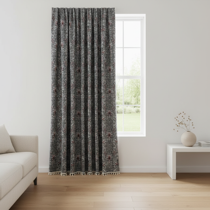 Thistle Ebonleaf floral tapestry curtain hung on a window in a styled room