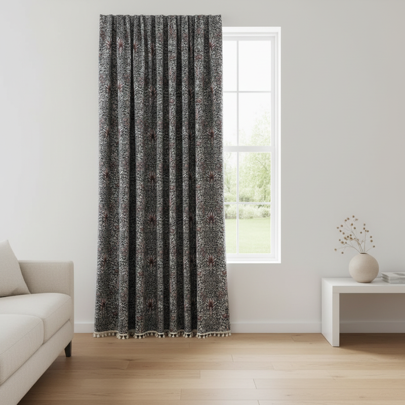 Thistle Ebonleaf floral tapestry curtain hung on a window in a styled room