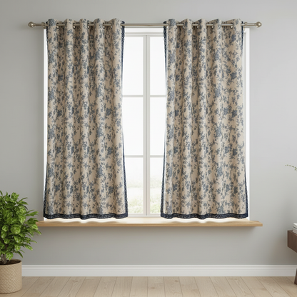 Maribelle floral lace curtain hung at a window in a styled room